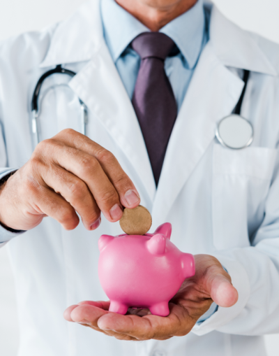 cropped-view-of-doctor-in-white-coat-putting-coin-2023-11-27-05-10-29-utc 2